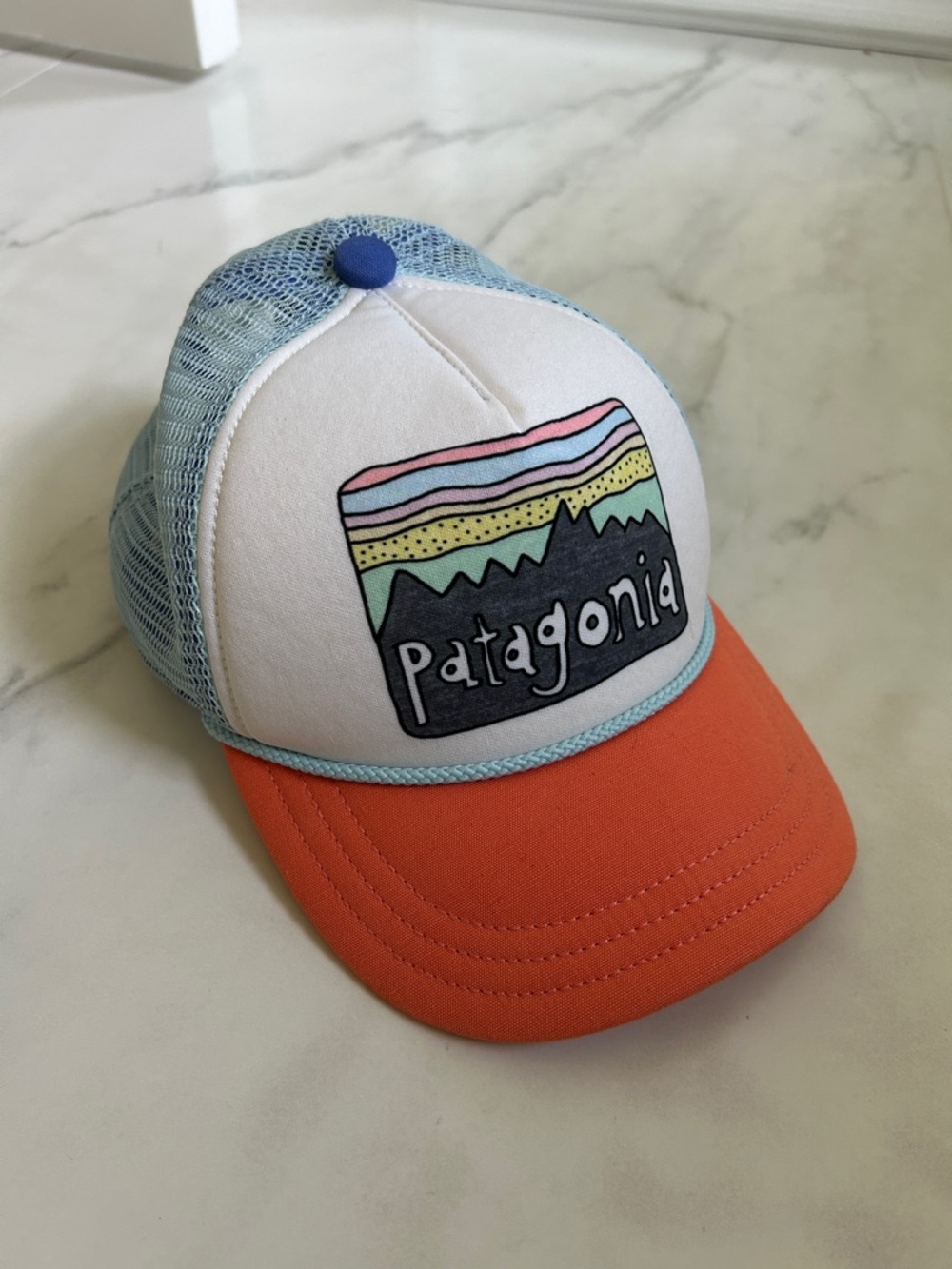 Patagonia Orange Brim Trucker Hat with Light Blue Mesh